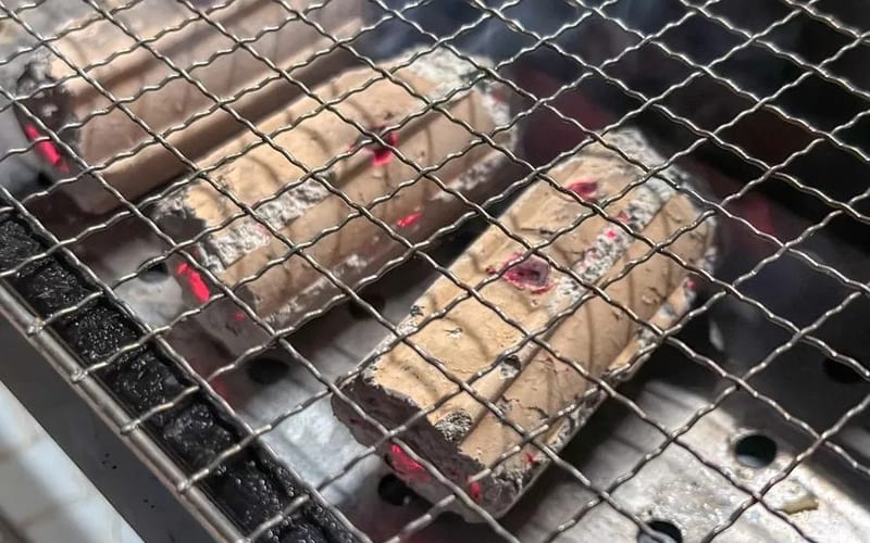 BBQ Charcoal Briquettes on Grill — Indonesia Export Supply